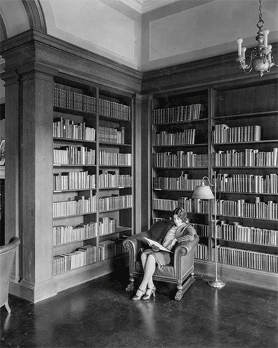Photograph, Historical Photograph Collection (1855–2012), Columbia University in the City of New York Photograph of a woman sitting in the Paterno Library.