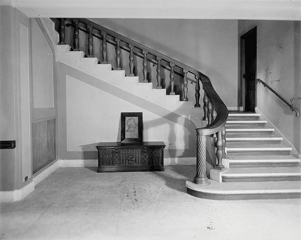 Photograph of the original curved stairwell in the lobby of the Casa Italiana.
