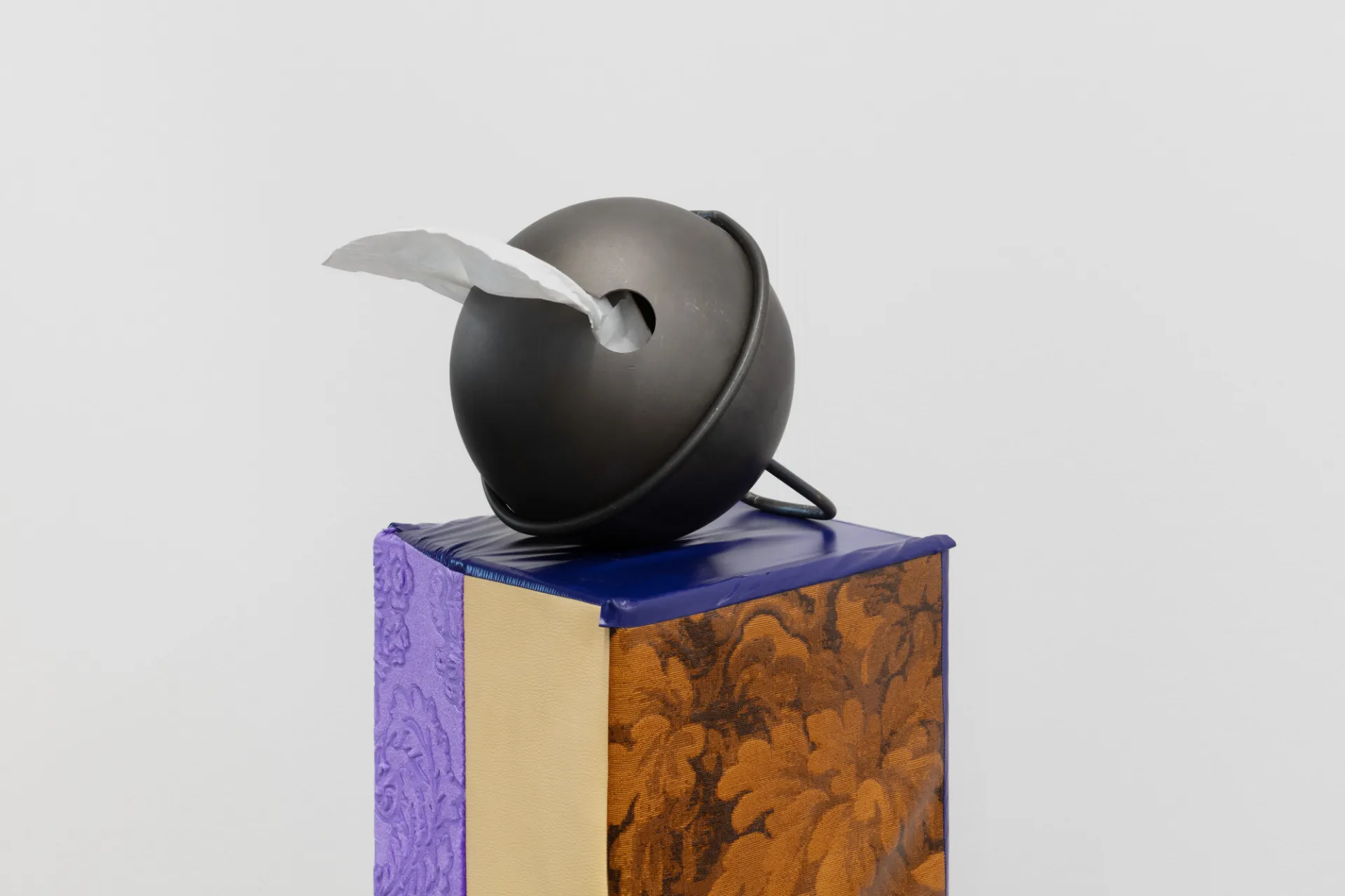 large bell with paper coming out