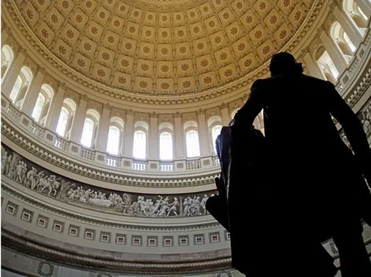 Image: Constantino Brumidi's frieze inside the United States Capitol rotunda. The Frieze of American History (1877) is 300 feet long and was started by Constantino Brumidi (1805–1880) in 1877. In the foreground here is a statue of George Washington.